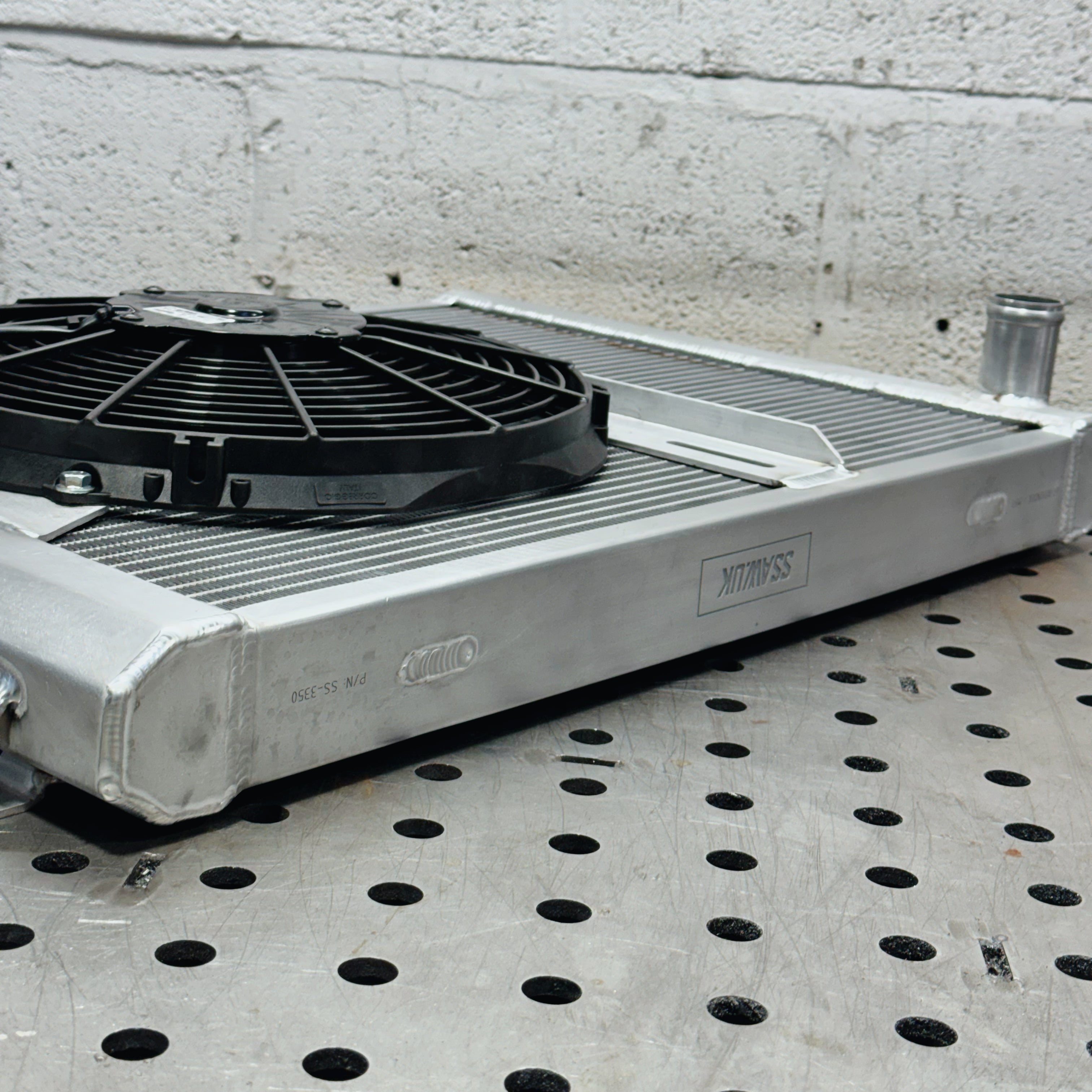 LAND ROVER DEFENDER PUMA ALUMINIUM RADIATOR W/ FAN MOUNT